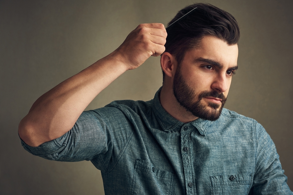 Man Looking through his hair